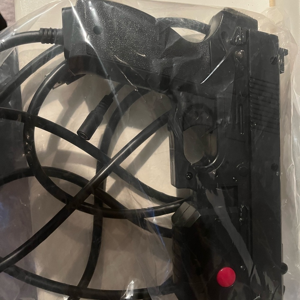 Guns that were purchased to be used on commercial arcade systems.  Hard to find